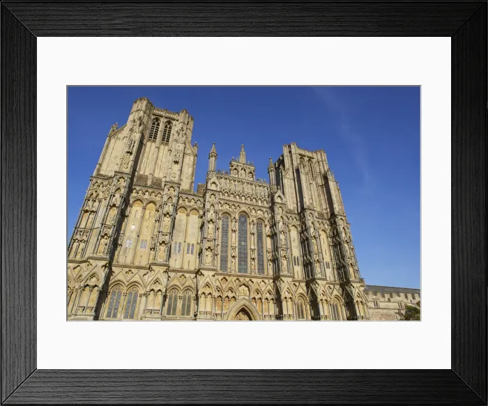 Framed Print : The historic western facade of Wells Cathedral, with its twin square towers, in Wells Framed Print : The historic western facade of Wells Cathedral, with its twin square towers, in Wells