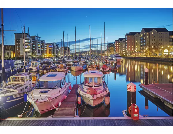 A dusk view of the modernised harbour and marina at Portishead, near Bristol, in Somerset
