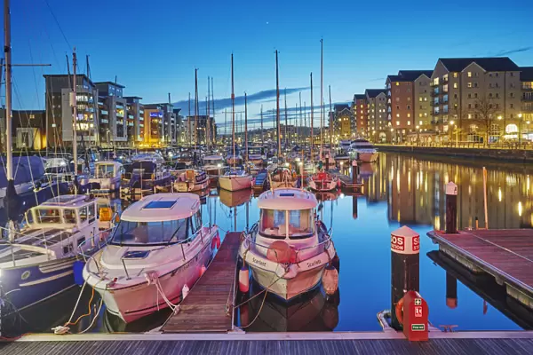 A dusk view of the modernised harbour and marina at Portishead, near Bristol, in Somerset