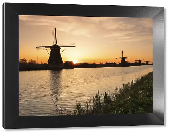 Windmills at sunrise, Kinderdijk, UNESCO World Heritage Site, South Holland, Netherlands