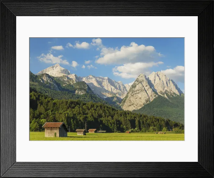 Framed Print : Hay barns at Hammersbach Footpath against Wetterstein Mountain Range Framed Print : Hay barns at Hammersbach Footpath against Wetterstein Mountain Range