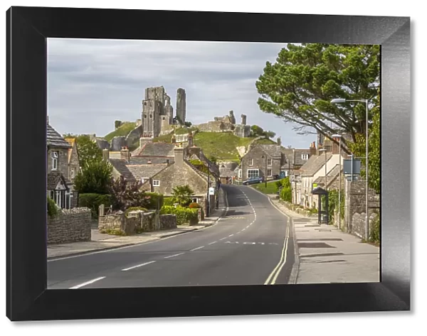 View of cottages on East Street and Corfe Castle, Corfe, Dorset, England, United Kingdom