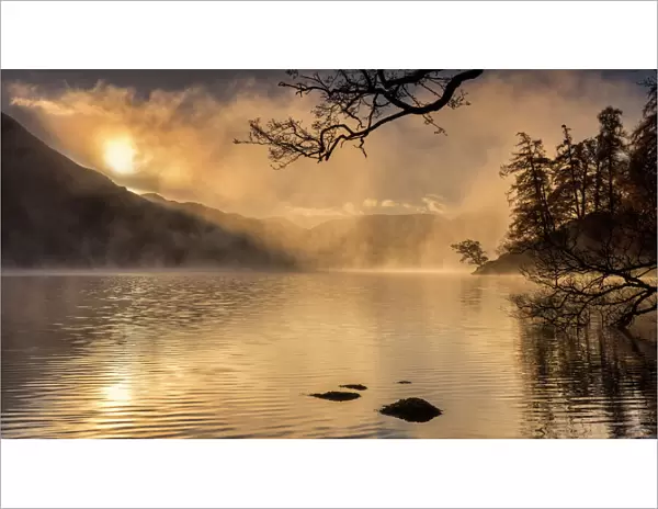 Dawn light and clearing mist over Glenridding and Ullswater, Lake District National Park