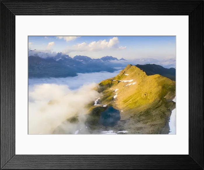 Framed Print : Schwarziseeli lake and Stotzigen Firsten mountain emerging from a sea of clouds Framed Print : Schwarziseeli lake and Stotzigen Firsten mountain emerging from a sea of clouds