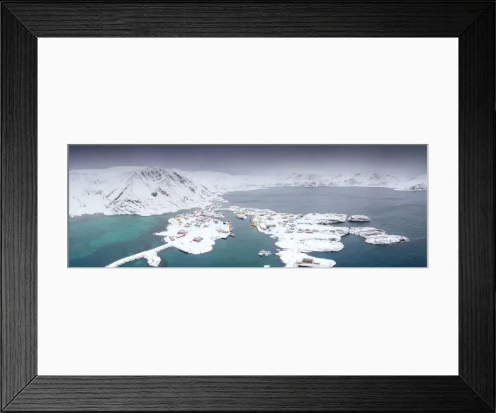 Framed Print : Aerial view of mountains and sea surrounding Sorvaer after a snow blizzard, Soroya Island Framed Print : Aerial view of mountains and sea surrounding Sorvaer after a snow blizzard, Soroya Island