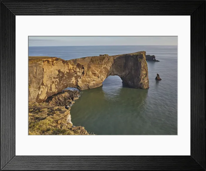 Framed Print : A rock arch on the southern shore of spectacular Dyrholaey Island, near Vik Framed Print : A rock arch on the southern shore of spectacular Dyrholaey Island, near Vik