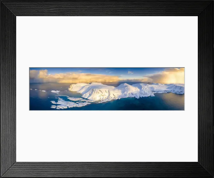 Framed Print : Arctic sunrise on snow capped mountains and cold sea, aerial view, Sorvaer, Soroya Island Framed Print : Arctic sunrise on snow capped mountains and cold sea, aerial view, Sorvaer, Soroya Island