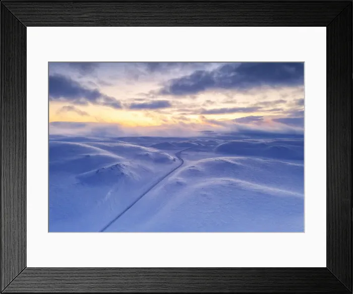Framed Print : Arctic sunset over Tanafjordveien empty road crossing the snowy mountains after blizzard Framed Print : Arctic sunset over Tanafjordveien empty road crossing the snowy mountains after blizzard