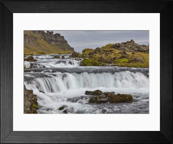 Framed Print : A classic Icelandic landscape, a river flowing along the base of a cliff Framed Print : A classic Icelandic landscape, a river flowing along the base of a cliff