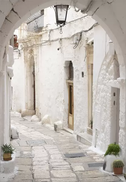 Narrow street in the Old Town, Ostuni, Puglia, Italy, Europe