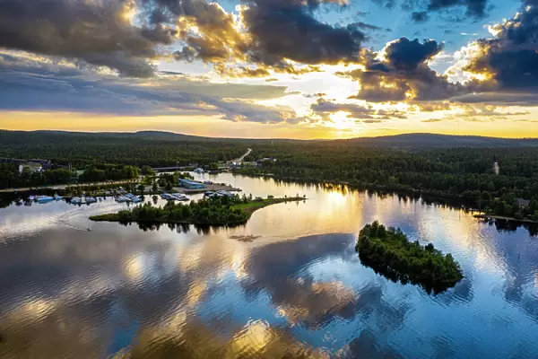 Clouds reflecting at sunset on Lake Inari, Inari, Lapland, northern Finland, Europe