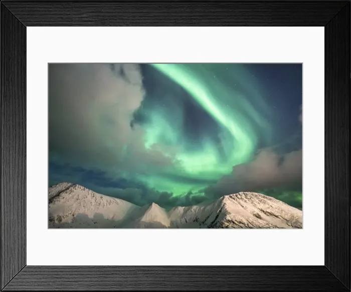 Framed Print : Northern Lights (Aurora Borealis) over mountain peaks covered with snow, Sorvaer Framed Print : Northern Lights (Aurora Borealis) over mountain peaks covered with snow, Sorvaer