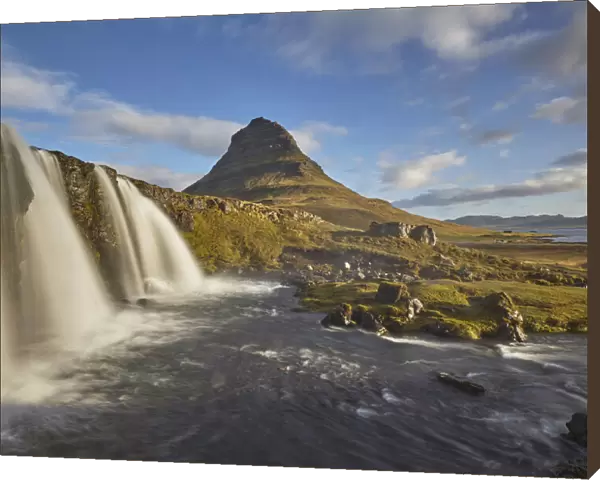 One of Icelands iconic landscapes, Mount Kirkjufell and Kirkjufellsfoss Falls