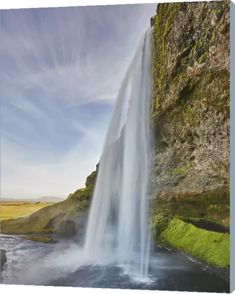 A spectacular sheer waterfall, Seljalandsfoss Falls, near Vik
