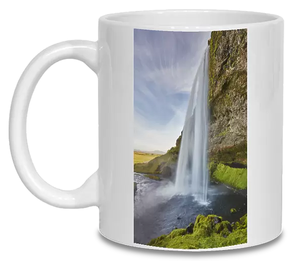 A spectacular sheer waterfall, Seljalandsfoss Falls, near Vik
