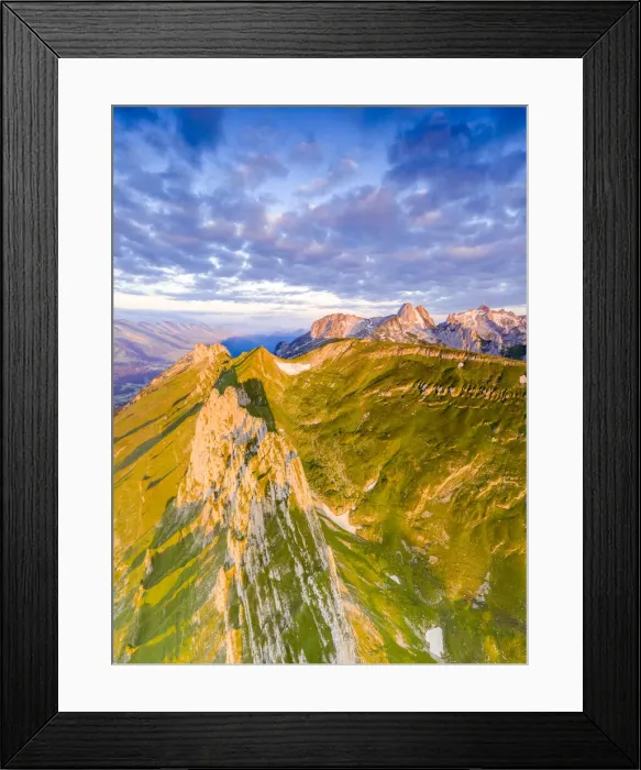 Framed Print : Clouds at dawn over the majestic peaks of Santis and Saxer Lucke, aerial view Framed Print : Clouds at dawn over the majestic peaks of Santis and Saxer Lucke, aerial view