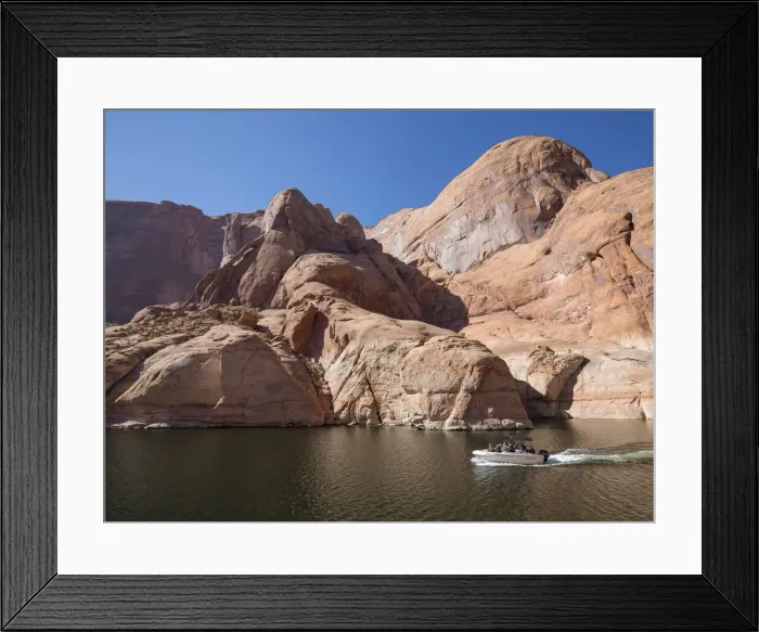 Framed Print : Small pleasure boat in Forbidding Canyon, a narrow arm of Lake Powell Framed Print : Small pleasure boat in Forbidding Canyon, a narrow arm of Lake Powell