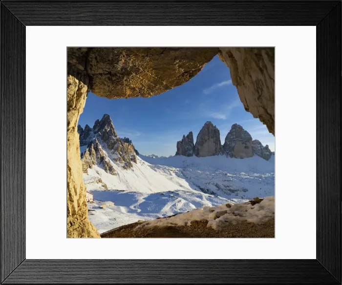 Framed Print : Sunset over the snow capped Tre Cime di Lavaredo and Monte Paterno seen from rock cave Framed Print : Sunset over the snow capped Tre Cime di Lavaredo and Monte Paterno seen from rock cave