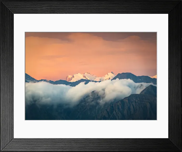 Framed Print : Burning sky at sunrise over the snow capped Monte Rosa surrounded by a sea of clouds Framed Print : Burning sky at sunrise over the snow capped Monte Rosa surrounded by a sea of clouds