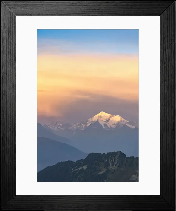 Framed Print : Clouds in the misty sky at dawn over Matterhorn and snow capped Weisshorn peak Framed Print : Clouds in the misty sky at dawn over Matterhorn and snow capped Weisshorn peak