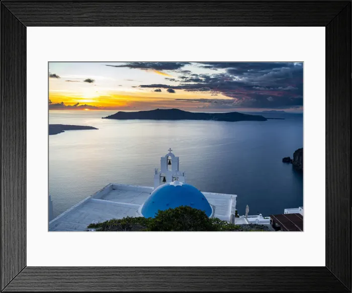 Framed Print : Sunset over the volcanic islands of Santorini and Anastasi Orthodox Church at sunset Framed Print : Sunset over the volcanic islands of Santorini and Anastasi Orthodox Church at sunset