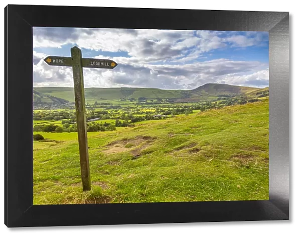 View of signpost and Hope Valley, Derbyshire Peak District, Derbyshire, England