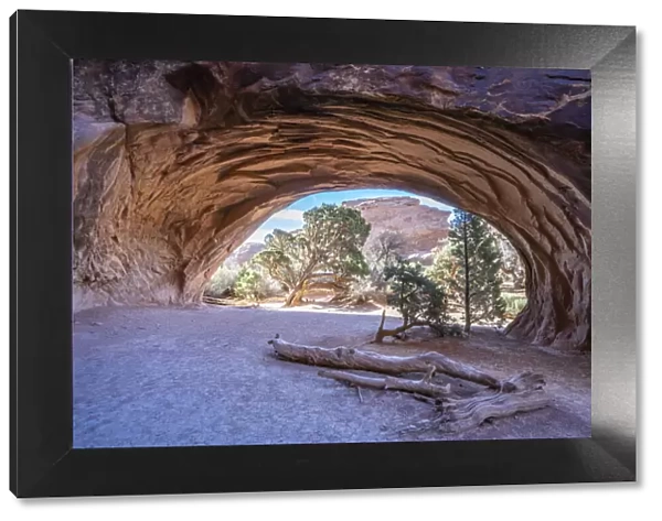 Landscape view through Navajo Arch, Arches National Park, Utah, United States of America