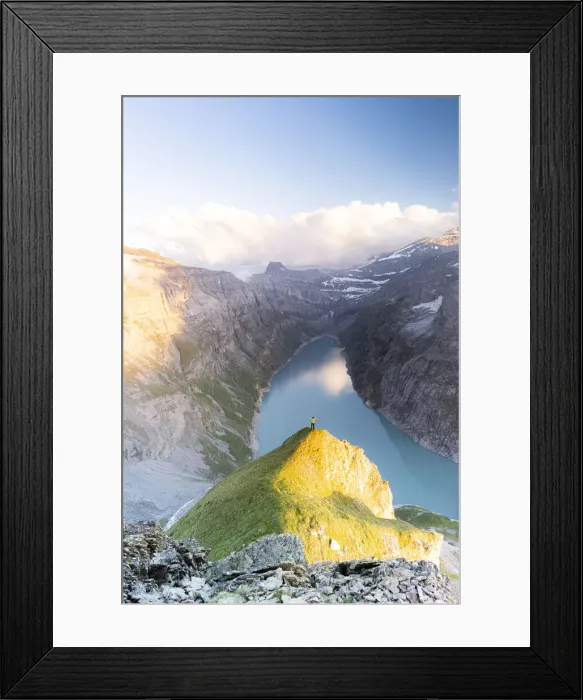 Framed Print : Aerial view of cheerful man with outstretched arms admiring lake Limmernsee at sunset Framed Print : Aerial view of cheerful man with outstretched arms admiring lake Limmernsee at sunset
