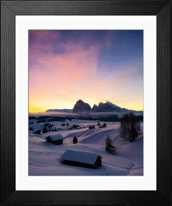 Framed Print : Mountain huts covered with snow at dawn with Sassopiatto and Sassolungo in background Framed Print : Mountain huts covered with snow at dawn with Sassopiatto and Sassolungo in background