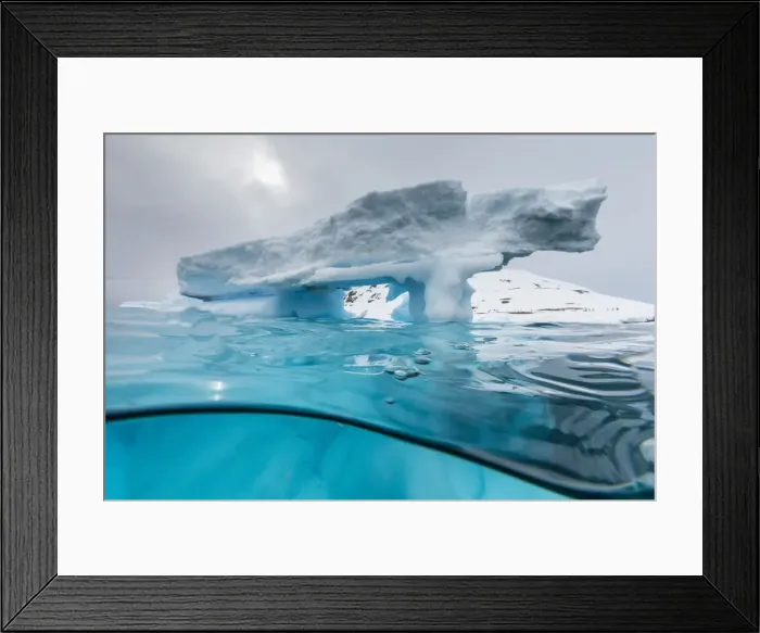Framed Print : Above and below view of an arch formed in an iceberg at Cuverville Island, Ererra Channel Framed Print : Above and below view of an arch formed in an iceberg at Cuverville Island, Ererra Channel