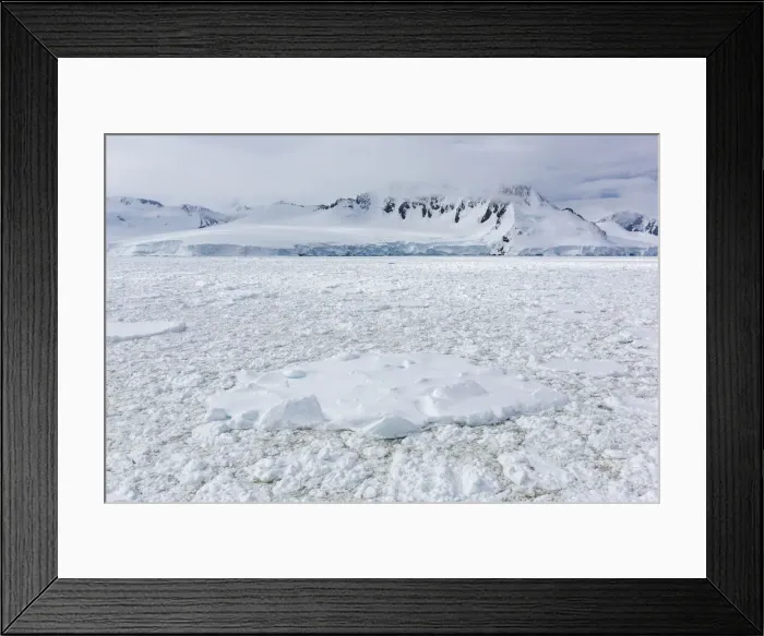 Framed Print : Snow-covered mountains and dense sea ice in Neumayer Channel, Palmer Archipelago Framed Print : Snow-covered mountains and dense sea ice in Neumayer Channel, Palmer Archipelago