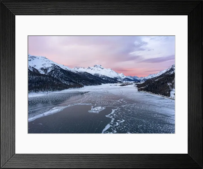 Framed Print : Sunrise on the snowcapped mountains and frozen Lake Silvaplana, aerial view, Maloja
