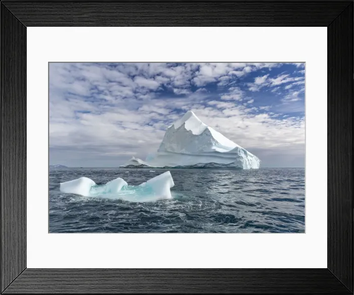 Framed Print : Huge icebergs at Cape Brewster, the easternmost point of the jagged Framed Print : Huge icebergs at Cape Brewster, the easternmost point of the jagged