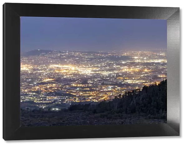 Panoramic of Naples city lights and Gulf at dusk from Vesuvius, Naples, Campania, Italy