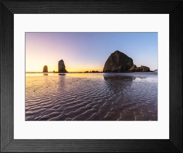 Framed Print : Haystack Rock and The Needles at sunset, with textured sand in the foreground Framed Print : Haystack Rock and The Needles at sunset, with textured sand in the foreground