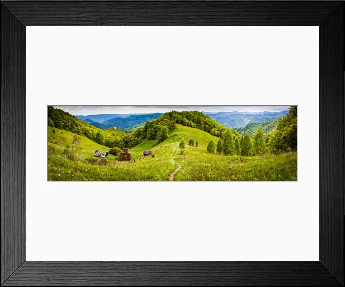 Framed Print : Rural landscape with traditional thatched roof wooden cottages in Dumesti Framed Print : Rural landscape with traditional thatched roof wooden cottages in Dumesti