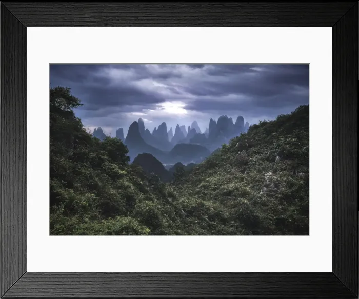 Framed Print : Yangshuo mountains with dark clouds framed by hills, Yangshuo, Guangxi, China, Asia Framed Print : Yangshuo mountains with dark clouds framed by hills, Yangshuo, Guangxi, China, Asia