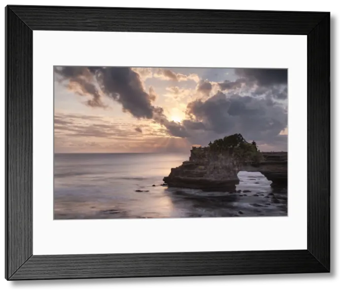 Framed Print : Sunset on Batu Bolong temple on a natural arch in the sea, Bali, Indonesia Framed Print : Sunset on Batu Bolong temple on a natural arch in the sea, Bali, Indonesia