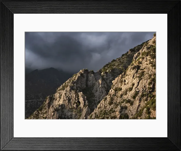 Framed Print : Sunset light on a rocky mountain and dark clouds in the sky, Chefchaouen, Morocco Framed Print : Sunset light on a rocky mountain and dark clouds in the sky, Chefchaouen, Morocco