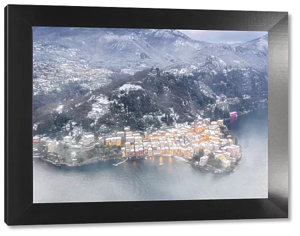 Romantic town of Varenna covered with snow, aerial view, Lake Como, Lecco province