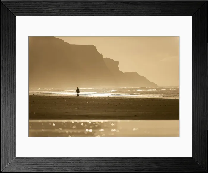 Framed Print : Person walking along beach in the evening sunlight, Rhossili, Gower Peninsula, Swansea Framed Print : Person walking along beach in the evening sunlight, Rhossili, Gower Peninsula, Swansea