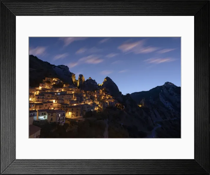 Framed Print : Illuminated village of Castelmezzano framed by Dolomiti Lucane peaks at sunrise Framed Print : Illuminated village of Castelmezzano framed by Dolomiti Lucane peaks at sunrise