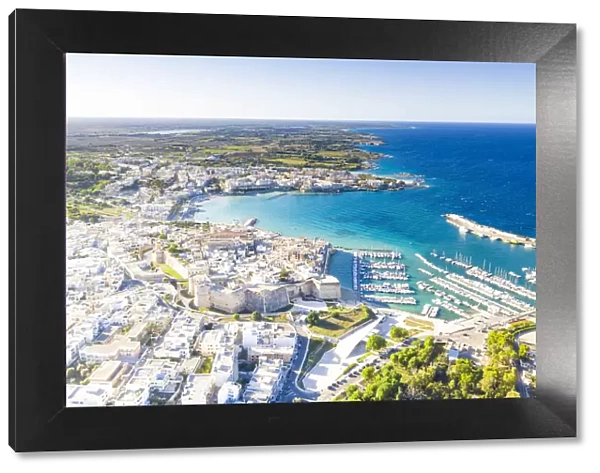 Aerial view of the coastal town of Otranto washed by the turquoise sea, Salento