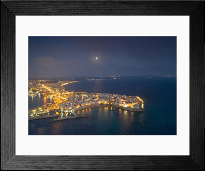 Framed Print : Aerial view of the coastal town of Gallipoli illuminated at night, Lecce province