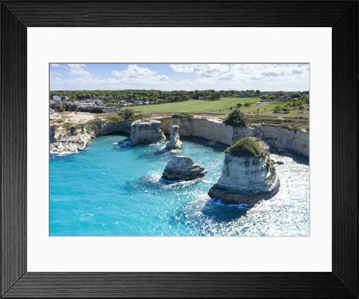 Framed Print : Faraglioni of Torre Sant Andrea and cliffs framed by turquoise sea, Lecce province Framed Print : Faraglioni of Torre Sant Andrea and cliffs framed by turquoise sea, Lecce province