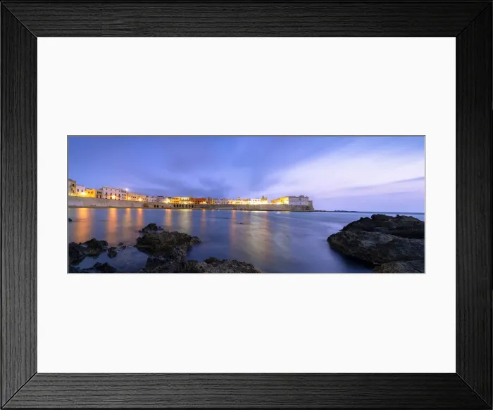 Framed Print : Clouds over Gallipoli washed by the Ionic Sea at dusk, Lecce province, Salento, Apulia