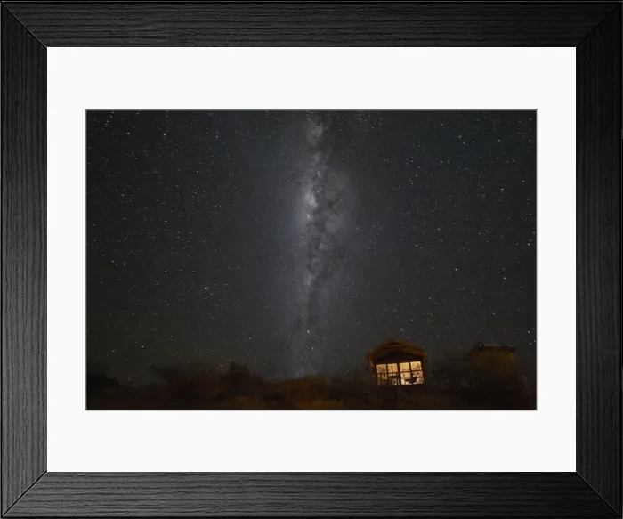 Framed Print : South hemisphere Milky Way and a small illuminated hut, Namibia, Africa Framed Print : South hemisphere Milky Way and a small illuminated hut, Namibia, Africa