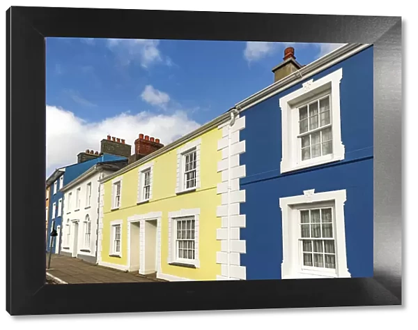 Some of the many colourful regency style houses by the harbour in this popular coastal