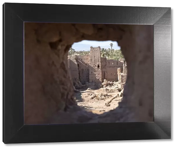 Kasbah ruins seen through an ancient kasbah window, Morocco, North Africa, Africa