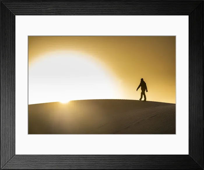 Framed Print : Man walking in backlight on a sand dune, Tenere desert, Niger, West Africa, Africa Framed Print : Man walking in backlight on a sand dune, Tenere desert, Niger, West Africa, Africa